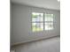Bright bedroom with large window and carpet flooring at 929 Canis Minor Rd, Wendell, NC 27591
