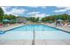 Inviting community swimming pool with plenty of lounge chairs at 929 Canis Minor Rd, Wendell, NC 27591