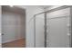 Clean bathroom with a walk-in shower and closet access at 933 Canis Minor Rd, Wendell, NC 27591
