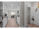 Long view of a modern kitchen with granite counters and stainless steel appliances at 99 Cambridge Way, Oxford, NC 27565