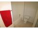 Bathroom with bathtub, toilet and red towel at 11321 Involute Pl # 102, Raleigh, NC 27617