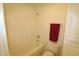 Clean bathroom with a bathtub, toilet and storage at 11321 Involute Pl # 102, Raleigh, NC 27617