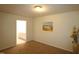 Bedroom with access to bathroom and sunflower decor at 11321 Involute Pl # 102, Raleigh, NC 27617