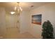 Bright dining area with tile floors and chandelier at 11321 Involute Pl # 102, Raleigh, NC 27617