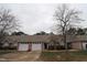Front view of charming townhome with two-car garage at 11321 Involute Pl # 102, Raleigh, NC 27617