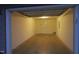 Single-car garage with automatic opener and storage at 11321 Involute Pl # 102, Raleigh, NC 27617