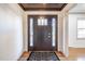 Inviting entryway with modern door and hardwood floors at 2804 Edgewood Ave, Burlington, NC 27215