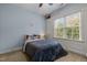 Cozy bedroom with a full-size bed and plenty of natural light at 5609 Clearsprings Dr, Wake Forest, NC 27587