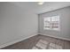 Bedroom with window and wood flooring at 707 Jamescroft Way, Rolesville, NC 27587