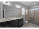 Bathroom with double vanity, large shower, and toilet at 709 Jamescroft Way, Rolesville, NC 27587