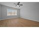 Bright bedroom with hardwood floors and large window at 709 Jamescroft Way, Rolesville, NC 27587