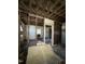 Demolished interior showing the home's floor plan and exposed ceiling joists at 762 Nashville Rd, Rocky Mount, NC 27803