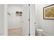 Clean bathroom with toilet and walk-in closet at 97 Ethel Ln, Angier, NC 27501
