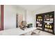 Spacious bedroom with built-in shelving and a large workspace at 97 Ethel Ln, Angier, NC 27501