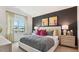 Main bedroom with king-size bed and dark gray accent wall at 97 Ethel Ln, Angier, NC 27501