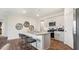 Eat-in kitchen with breakfast bar, granite countertops, and stainless steel appliances at 97 Ethel Ln, Angier, NC 27501