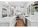 Spacious kitchen featuring stainless steel appliances and marble countertops at 106 Billington Ct, Cary, NC 27519