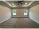 Bright bedroom with carpet and ceiling fan at 115 Lemon Drop Ln, Franklinton, NC 27525