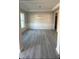 Spacious dining room with wainscoting and hardwood floors at 115 Lemon Drop Ln, Franklinton, NC 27525