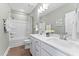 Clean bathroom boasts a double vanity and shower/tub combo at 1235 Shaw View Alley # 201, Raleigh, NC 27601