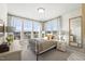 Spacious bedroom with large windows and a metal bed frame at 1235 Shaw View Alley # 201, Raleigh, NC 27601