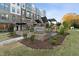 Community courtyard with brick seating and shade structures at 1235 Shaw View Alley # 201, Raleigh, NC 27601