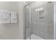Walk-in shower with glass enclosure and built-in shelves at 1235 Shaw View Alley # 201, Raleigh, NC 27601