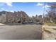 Urban street with parked cars and brick buildings at 1235 Shaw View Alley # 201, Raleigh, NC 27601