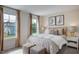 Spacious bedroom with king-size bed and neutral color palette at 166 Blue Butterfly Dr, Angier, NC 27501