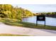 Lakeside walking trails with fall foliage at 166 Blue Butterfly Dr, Angier, NC 27501