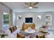 Spacious living room featuring a large TV and comfortable seating at 166 Blue Butterfly Dr, Angier, NC 27501