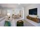 Bright and airy loft features comfortable seating and a large TV at 166 Blue Butterfly Dr, Angier, NC 27501