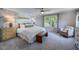 Relaxing main bedroom with king bed and sitting area at 166 Blue Butterfly Dr, Angier, NC 27501