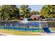 Community park with tennis courts, pond, and skate ramp at 166 Blue Butterfly Dr, Angier, NC 27501