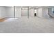 Unfinished basement with carpeted floor and high ceilings at 4700 Linaria Ln, Fuquay Varina, NC 27526
