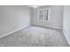 Bright bedroom featuring neutral walls and carpet at 4700 Linaria Ln, Fuquay Varina, NC 27526
