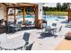 Community pool area with tables and chairs at 800 Heathered Farm Way, Apex, NC 27523