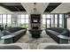 Common area with couches and a fireplace at 120 Mosaic Blvd # 307, Pittsboro, NC 27312