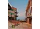 Evening view of a community courtyard with seating at 120 Mosaic Blvd # 307, Pittsboro, NC 27312