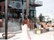 Outdoor town square with seating and a restaurant at 120 Mosaic Blvd # 307, Pittsboro, NC 27312