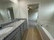 Bathroom with double vanity and garden tub at 172 Tulipfield Way, Benson, NC 27504