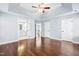 Spacious main bedroom with hardwood floors and tray ceiling at 2002 Frissell Ave, Apex, NC 27502