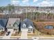 Aerial view showcasing a beautiful home nestled in a quiet, tree-lined neighborhood at 210 Monteith Dr, Chapel Hill, NC 27516