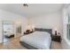 Spacious bedroom with large window and ensuite bathroom access at 210 Monteith Dr, Chapel Hill, NC 27516
