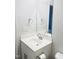 White bathroom vanity with a round sink and mirror at 242 Liam St, Clayton, NC 27520