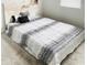 Main bedroom with patterned bedding and large headboard at 242 Liam St, Clayton, NC 27520