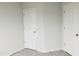 Spacious bedroom closet with double doors at 242 Liam St, Clayton, NC 27520