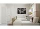 Two twin beds in a shared bedroom with light walls and soft decor at 340 Canyon Spring Trl, Wake Forest, NC 27587