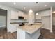 Modern kitchen with granite countertops and stainless steel appliances at 68 Northwood Dr, Fuquay Varina, NC 27526