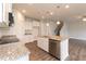 Eat-in kitchen with granite countertops and stainless steel appliances at 68 Northwood Dr, Fuquay Varina, NC 27526